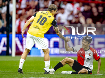 NAC Breda player Elias Mar Omarsson and Feyenoord Rotterdam midfielder Inbeom Hwang during the match Feyenoord vs. NAC at Stadium De Kuip fo...