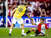 NAC Breda player Elias Mar Omarsson and Feyenoord Rotterdam midfielder Inbeom Hwang during the match Feyenoord vs. NAC at Stadium De Kuip fo...