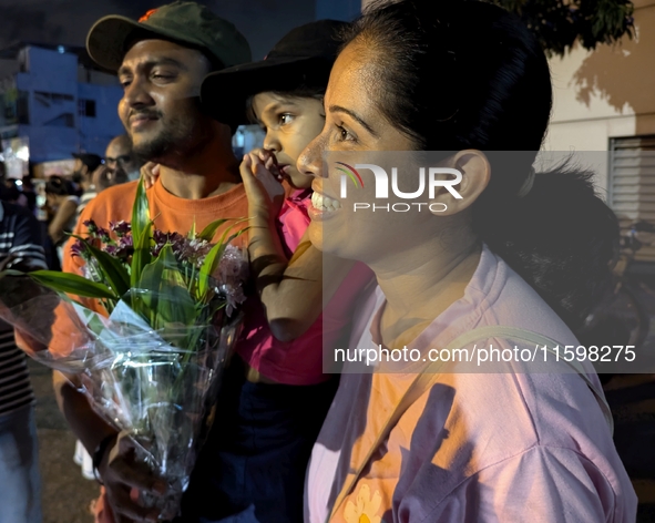 Supporters of Sri Lanka's new president, Anurakumara Dissanayake, celebrate his victory outside the election commission in Colombo, Sri Lank...