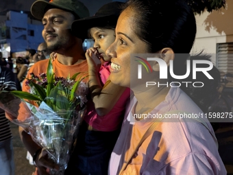 Supporters of Sri Lanka's new president, Anurakumara Dissanayake, celebrate his victory outside the election commission in Colombo, Sri Lank...