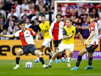 NAC Breda player Elias Mar Omarsson and Feyenoord Rotterdam midfielder Inbeom Hwang during the match Feyenoord vs. NAC at Stadium De Kuip fo...