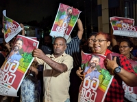 Supporters of Sri Lanka's new president, Anurakumara Dissanayake, celebrate his victory outside the election commission in Colombo, Sri Lank...