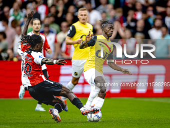 Feyenoord Rotterdam defender Jordan Lotomba and NAC Breda forward Sana Fernandes during the match Feyenoord vs. NAC at Stadium De Kuip for t...