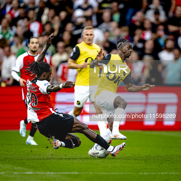 Feyenoord Rotterdam defender Jordan Lotomba and NAC Breda forward Sana Fernandes during the match Feyenoord vs. NAC at Stadium De Kuip for t...