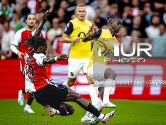 Feyenoord Rotterdam defender Jordan Lotomba and NAC Breda forward Sana Fernandes during the match Feyenoord vs. NAC at Stadium De Kuip for t...