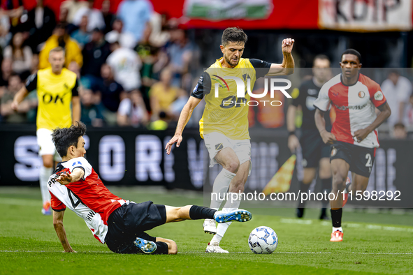 Feyenoord Rotterdam midfielder Inbeom Hwang and NAC Breda defender Fredrik Oldrup Jensen during the match between Feyenoord and NAC at Stadi...