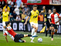 Feyenoord Rotterdam midfielder Inbeom Hwang and NAC Breda defender Fredrik Oldrup Jensen during the match between Feyenoord and NAC at Stadi...