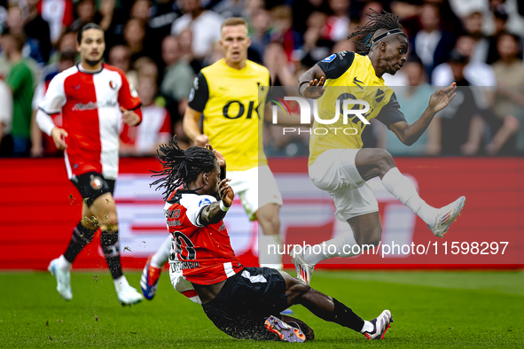 Feyenoord Rotterdam defender Jordan Lotomba and NAC Breda forward Sana Fernandes during the match Feyenoord vs. NAC at Stadium De Kuip for t...