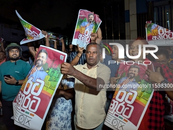 Supporters of Sri Lanka's new president, Anurakumara Dissanayake, celebrate his victory outside the election commission in Colombo, Sri Lank...