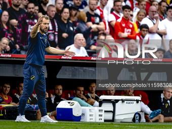 NAC assistant trainer Tomasz Kaczmarek during the match between Feyenoord and NAC at Stadium De Kuip for the Dutch Eredivisie season 2024-20...