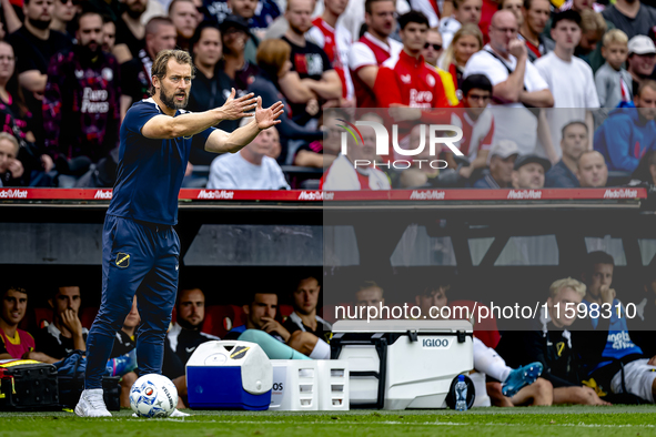 NAC assistant trainer Tomasz Kaczmarek during the match between Feyenoord and NAC at Stadium De Kuip for the Dutch Eredivisie season 2024-20...