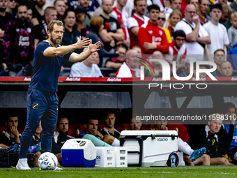 NAC assistant trainer Tomasz Kaczmarek during the match between Feyenoord and NAC at Stadium De Kuip for the Dutch Eredivisie season 2024-20...