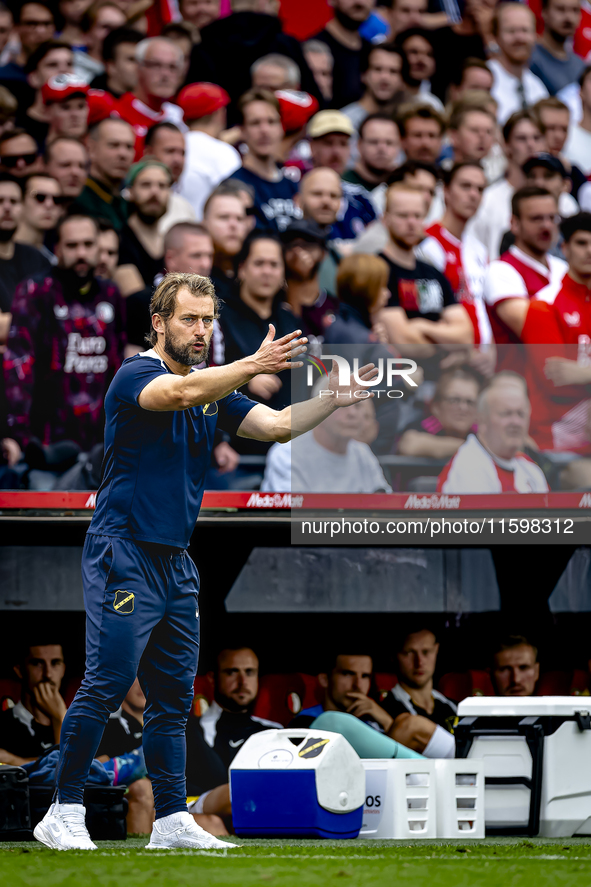 NAC assistant trainer Tomasz Kaczmarek during the match between Feyenoord and NAC at Stadium De Kuip for the Dutch Eredivisie season 2024-20...