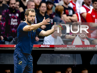 NAC assistant trainer Tomasz Kaczmarek during the match between Feyenoord and NAC at Stadium De Kuip for the Dutch Eredivisie season 2024-20...