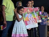 Supporters of Sri Lanka's new president, Anurakumara Dissanayake, celebrate his victory outside the election commission in Colombo, Sri Lank...