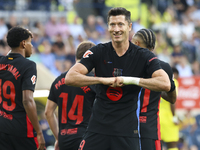 Robert Lewandowski of FC Barcelona celebrates after scoring the 0-2 goal with his teammate during the La Liga match between Villarreal CF an...