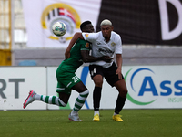 Franklin Sasere (L) of Floriana vies for the ball with Nunes Silva Pedro Henrique (R) of Hibernians during the Malta 360 Sports Premier Leag...