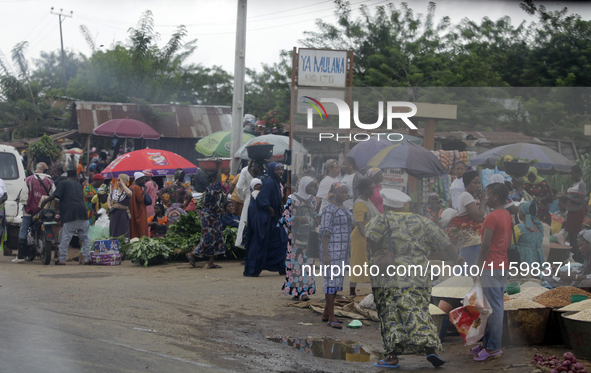 Business activities boom at Akinola Market, Ipetu, along Ife-Ibadan Expressway in Osun State, Nigeria, on September 20, 2024. Many city dwel...