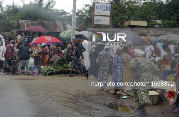 Business activities boom at Akinola Market, Ipetu, along Ife-Ibadan Expressway in Osun State, Nigeria, on September 20, 2024. Many city dwel...