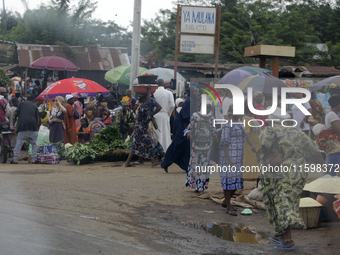 Business activities boom at Akinola Market, Ipetu, along Ife-Ibadan Expressway in Osun State, Nigeria, on September 20, 2024. Many city dwel...