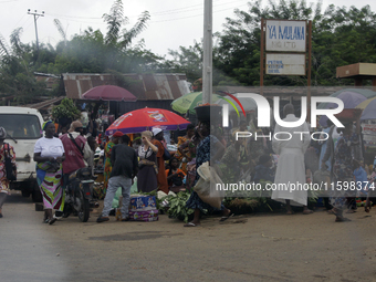 Business activities boom at Akinola Market, Ipetu, along Ife-Ibadan Expressway in Osun State, Nigeria, on September 20, 2024. Many city dwel...