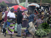 Business activities boom at Akinola Market, Ipetu, along Ife-Ibadan Expressway in Osun State, Nigeria, on September 20, 2024. Many city dwel...