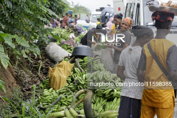 Business activities boom at the banana section of Akinola Market in Ipetu, along Ife-Ibadan Expressway in Osun State, Nigeria, on September...