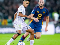 Brenner of Udinese Calcio and Bryan Cristante of AS Roma compete for the ball during the Serie A Enilive match between AS Roma and Udinese C...