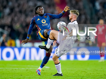 Iker Bravo of Udinese Calcio and Manu Kone' of AS Roma compete for the ball during the Serie A Enilive match between AS Roma and Udinese Cal...