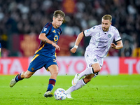 Tommaso Baldanzi of AS Roma and Sandi Lovric of Udinese Calcio compete for the ball during the Serie A Enilive match between AS Roma and Udi...