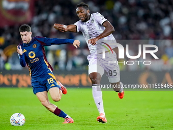 Matias Soule' of AS Roma and Isaak Toure' of Udinese Calcio compete for the ball during the Serie A Enilive match between AS Roma and Udines...