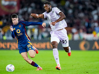 Matias Soule' of AS Roma and Isaak Toure' of Udinese Calcio compete for the ball during the Serie A Enilive match between AS Roma and Udines...