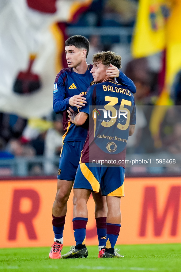 Matias Soule' of AS Roma celebrates the victory with Tommaso Baldanzi during the Serie A Enilive match between AS Roma and Udinese Calcio at...