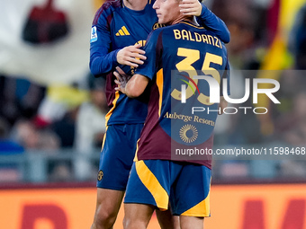 Matias Soule' of AS Roma celebrates the victory with Tommaso Baldanzi during the Serie A Enilive match between AS Roma and Udinese Calcio at...