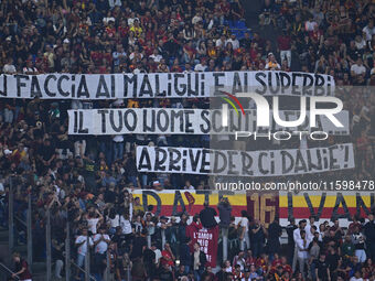 Supporters of A.S. Roma during the 5th day of the Serie A Championship between A.S. Roma and Udinese Calcio at the Olympic Stadium in Rome,...