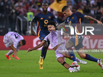 Brenner of Udinese Calcio and Gianluca Mancini of A.S. Roma are in action during the 5th day of the Serie A Championship between A.S. Roma a...