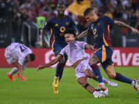 Brenner of Udinese Calcio and Gianluca Mancini of A.S. Roma are in action during the 5th day of the Serie A Championship between A.S. Roma a...