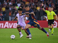 Brenner of Udinese Calcio and Gianluca Mancini of A.S. Roma are in action during the 5th day of the Serie A Championship between A.S. Roma a...