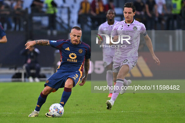 Angelino of A.S. Roma and Florian Thauvin of Udinese Calcio are in action during the 5th day of the Serie A Championship between A.S. Roma a...