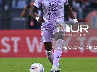 Hassane Kamara of Udinese Calcio is in action during the 5th day of the Serie A Championship between A.S. Roma and Udinese Calcio at the Oly...