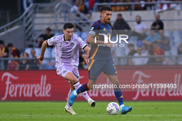 Florian Thauvin of Udinese Calcio and Lorenzo Pellegrini of A.S. Roma are in action during the 5th day of the Serie A Championship between A...