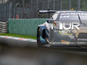 Augusto Farfus, Dan Harper, and Max Hesse of Team Rowe Racing drive a BMW M4 GT3 during the qualifying of the Fanatec GT World Challenge in...