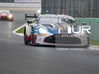 Maxime Robin, Romain Leroux, and Lorcan Hanafin of the Walkenhorst Motorsport team drive an Aston Martin Vantage AMR GT3 EVO during the qual...