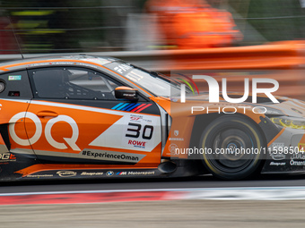 Jens Klingmann, Ahmad Al Harthy, and Sam De Haan of the team OQ by Oman Racing drive a BMW M4 GT3 during qualifying of the Fanatec GT World...