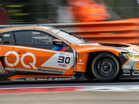 Jens Klingmann, Ahmad Al Harthy, and Sam De Haan of the team OQ by Oman Racing drive a BMW M4 GT3 during qualifying of the Fanatec GT World...