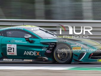 Charles Clark, Matisse Lismont, and Sam Dejonghe of the Comtoyou Racing team drive an Aston Martin Vantage AMR GT3 EVO during the qualifying...