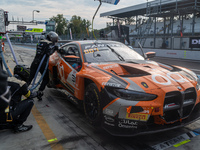 Jens Klingmann, Ahmad Al Harthy, and Sam De Haan of the team OQ by Oman Racing perform a pit stop on a BMW M4 GT3 during the Fanatec GT Worl...