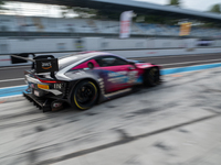 Mex Jansen, Tim Creswick, and Ben Green of the Walkenhorst Motorsport team exit the pit stop in an Aston Martin Vantage AMR GT3 EVO during t...