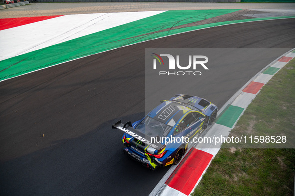 Maxime Martin, Raffaele Marciello, and Valentino Rossi of Team WRT drive a BMW M4 GT3 during a race of the Fanatec GT World Challenge in Mon...