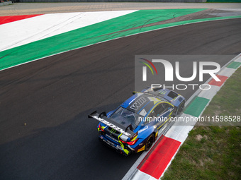 Maxime Martin, Raffaele Marciello, and Valentino Rossi of Team WRT drive a BMW M4 GT3 during a race of the Fanatec GT World Challenge in Mon...